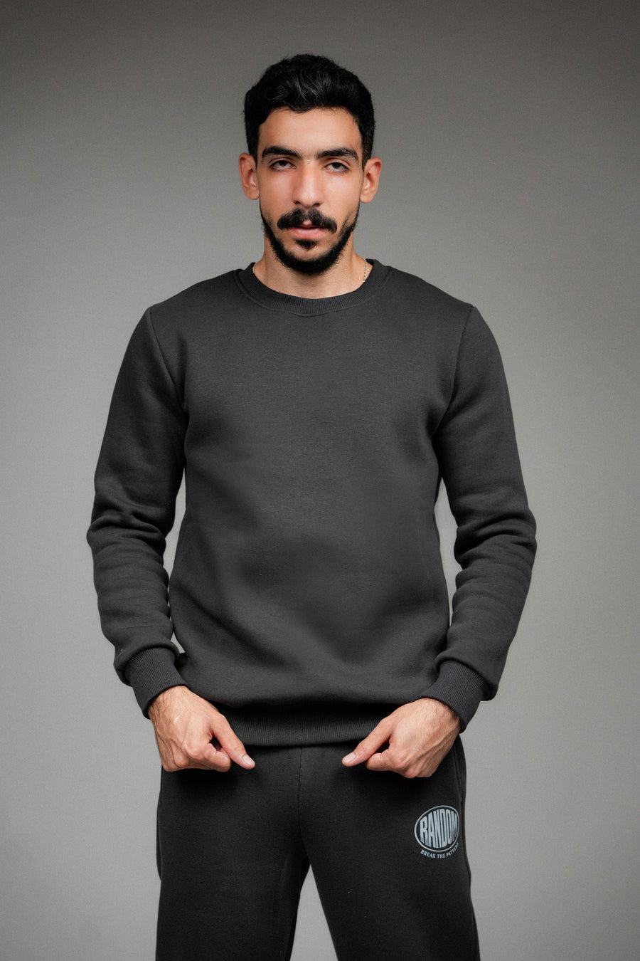 The  Charcoal Gray Crewneck — Born to Break the Pattern.